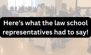 A faded image of people at a large law fair; the image is covered in a black text box with white font that says "Here's what the law school representatives had to say!"